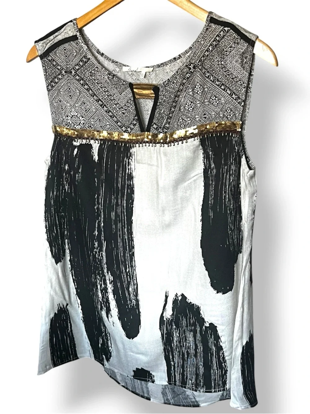 Free People Black and Cream Printed Sleeveless Blouse sequined in front.